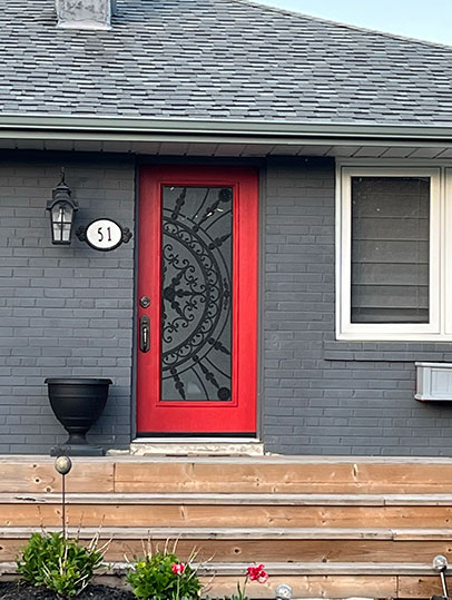 Red exterior wrought iron glass door insert